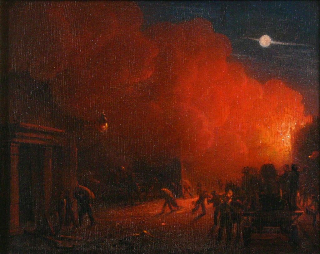 A dark scene depicting people working amidst a backdrop of red smoke and light, suggesting chaos or a fire. A full moon is visible in the sky.
